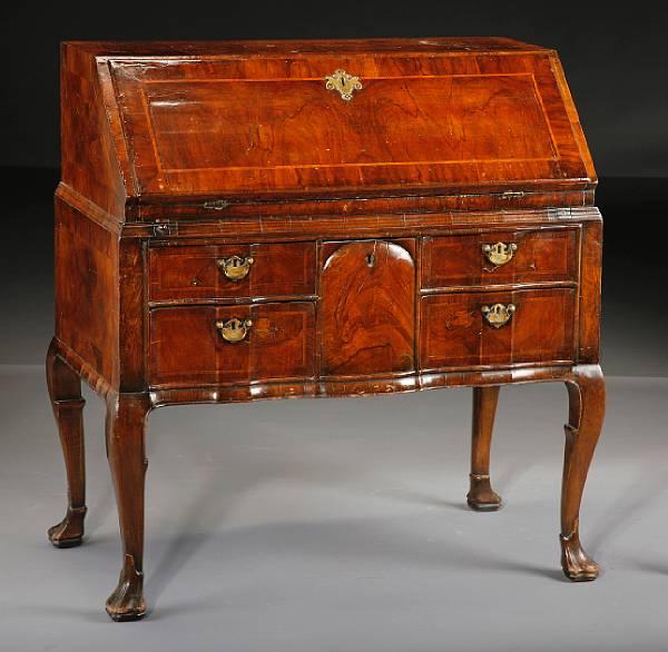 Appraisal: A Dutch Rococo walnut desk part th century The rectangular