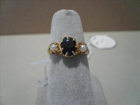 Appraisal: ALEXANDRITE AND PEARL RING Genuine alexandrite purchased out of a