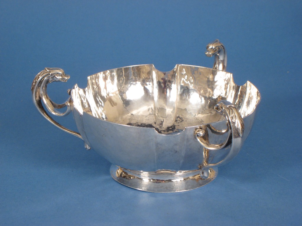 Appraisal: An Edward VII Art Nouveau shaped circular Bowl with hammered