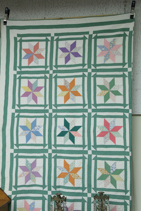 Appraisal: QUILT Green on white with polychrome boxed star decoration ''