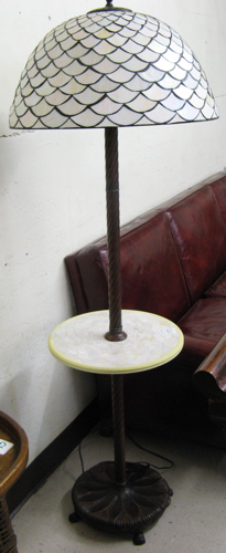 Appraisal: A LEADED GLASS AND BRONZED METAL FLOOR LAMP the domical