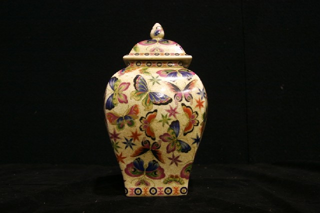 Appraisal: A Chinese crackle glazed jar and cover profusely decorated with