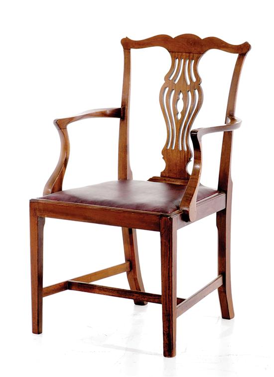 Appraisal: Georgian style carved mahogany armchair late th century yoke crest