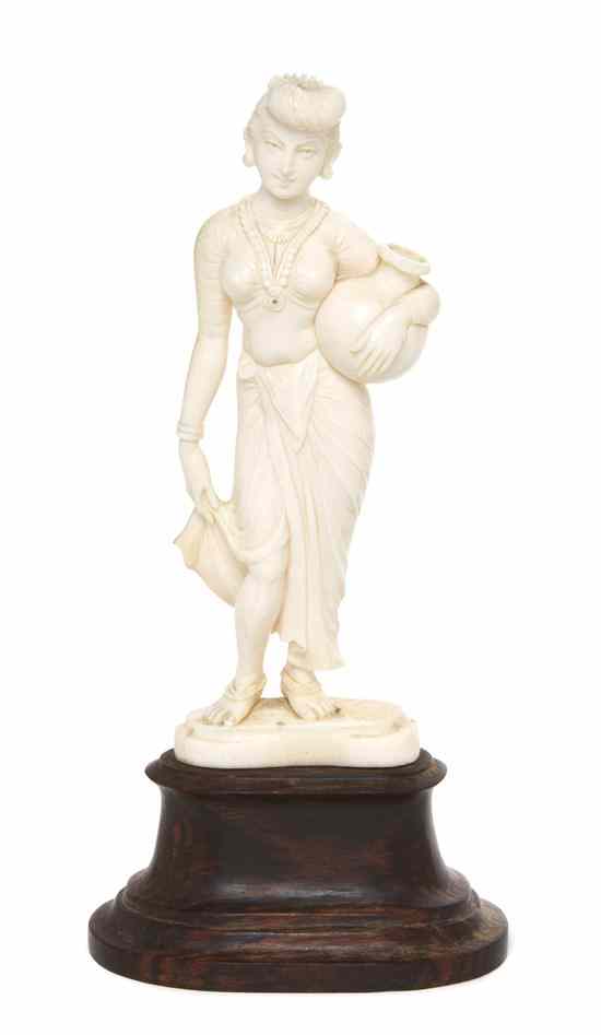 Appraisal: An Indian Ivory Carving of a Lady depicted in a