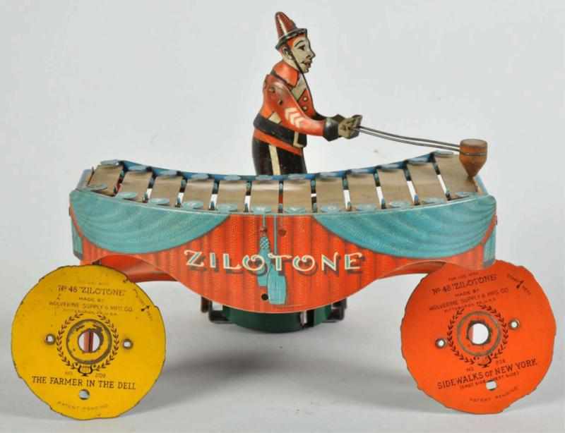 Appraisal: Tin Litho Wolverine Zilotone Wind-Up Toy Description American Original mallet