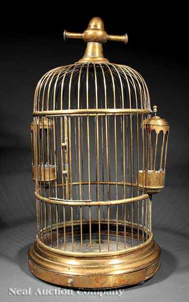 Appraisal: An Antique Brass Birdcage of typical form with outset domed