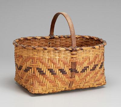 Appraisal: Cherokee river cane basket dyed weavers in broad diagonal bands