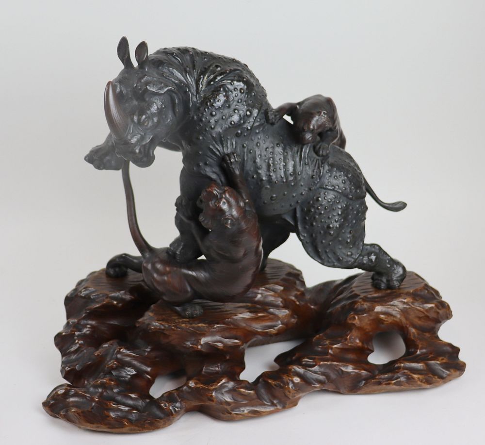 Appraisal: Signed Japanese Bronze Of A Rhino Under Attack On Wood