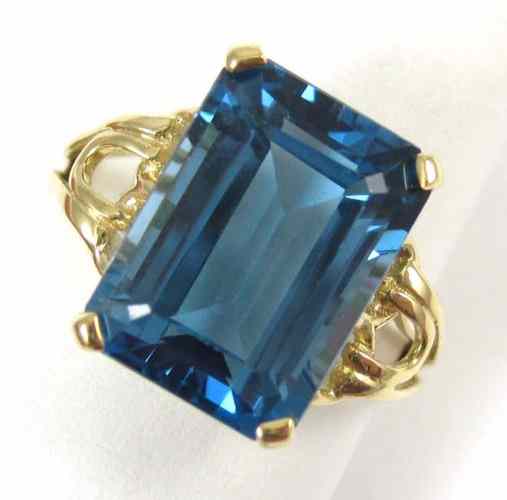 Appraisal: BLUE TOPAZ AND FOURTEEN KARAT GOLD RING four yellow gold