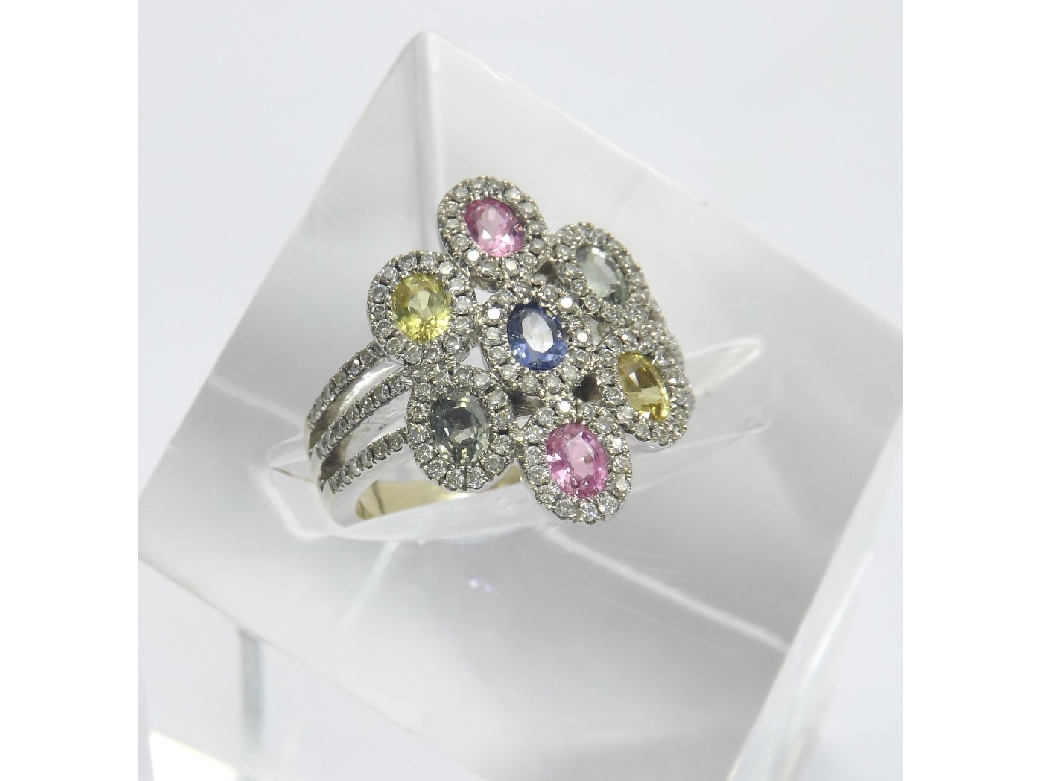 Appraisal: Attractive ct white gold diamond and gem set cluster ring