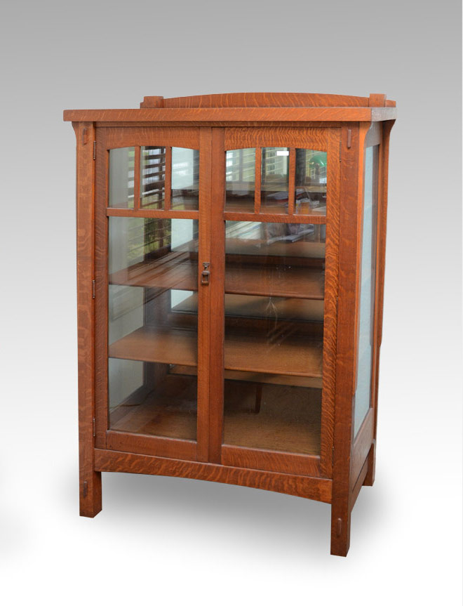 Appraisal: ARTS CRAFTS OAK CHINA CABINET Golden oak china cabinet the