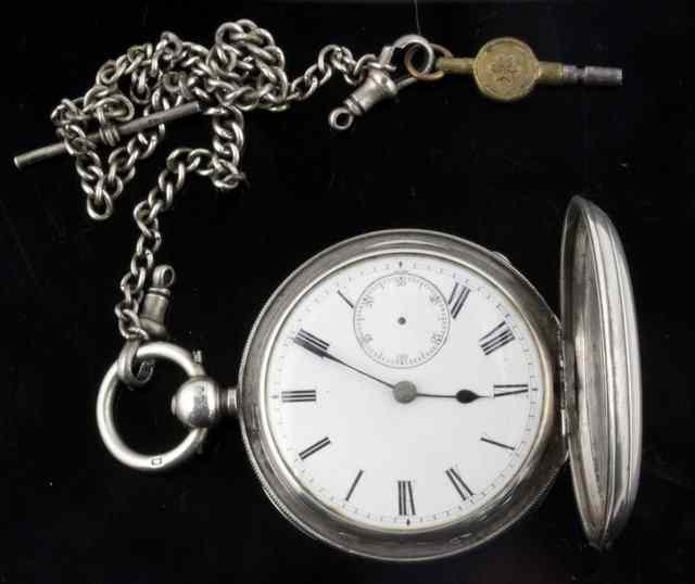 Appraisal: A silver hunter pocket watch the white enamel dial with