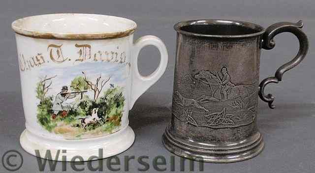 Appraisal: Pewter mug with a raised relief foxhunting scene h th