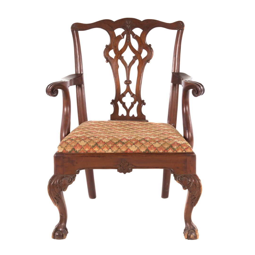 Appraisal: Chippendale style carved walnut armchair late th century serpentine crest