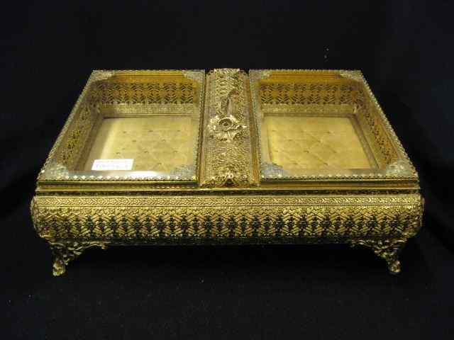 Appraisal: Italian Gilt Metalwork Jewelry Box beveledglass doors tufted velvet lining