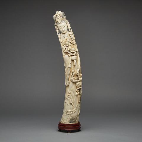 Appraisal: A Large Ivory Carved Lady Early th Century Adorned in