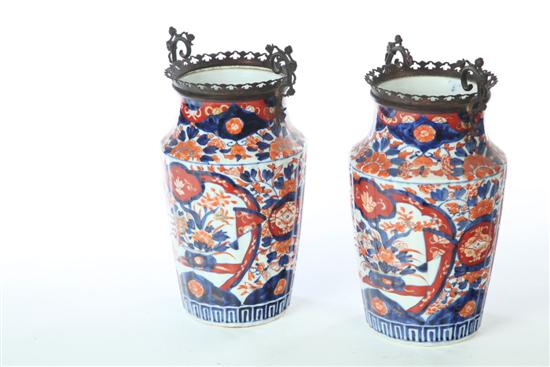 Appraisal: PAIR OF IMARI VASES Japan early th century Ribbed vases