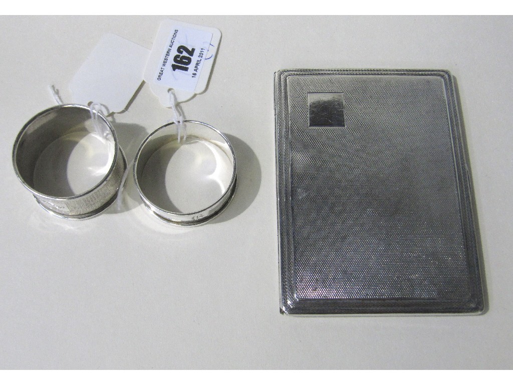 Appraisal: Lot comprising silver cigarette case and two silver napkin rings