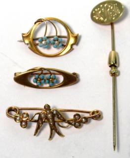 Appraisal: Victorian Gold Pins Comprising two K gold hoops each supporting