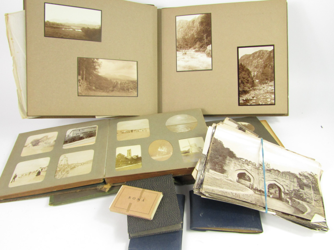 Appraisal: Three albums of Edwardian and later photograph albums loose black