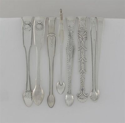 Appraisal: Eight various George III pairs of sugar tongs a 'sprung