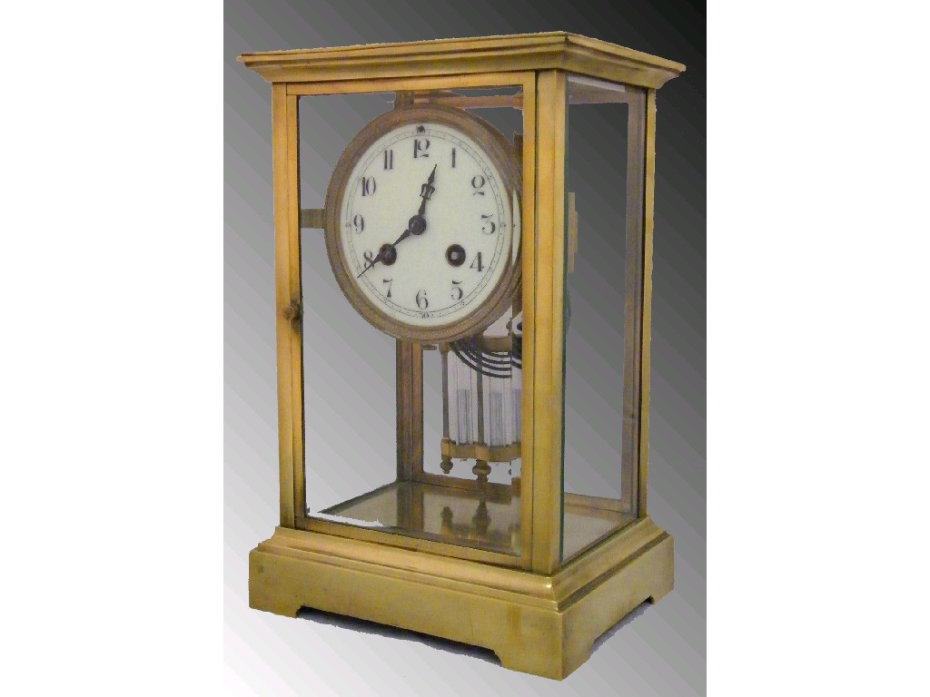 Appraisal: French brass two train four glass mantel clock the Japy