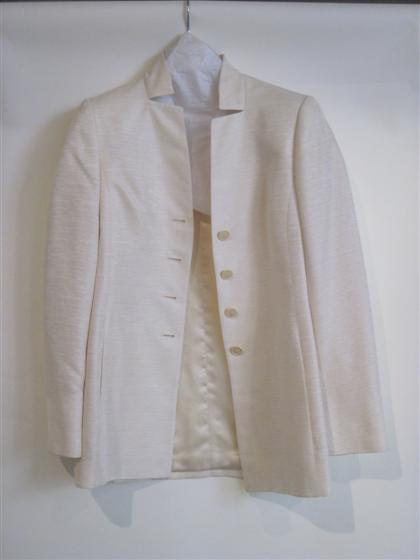 Appraisal: Cream silk pants suit AkrisRaw silk long jacket hits at