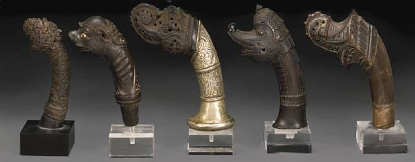 Appraisal: A lot of five Indonesian sword hilts th th century