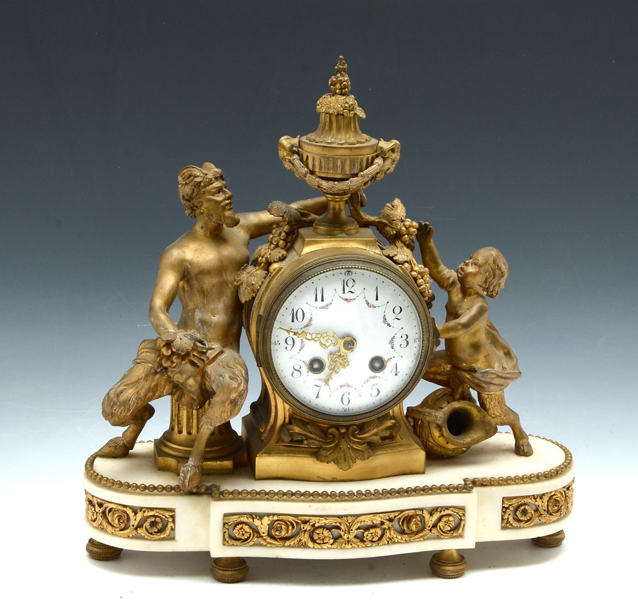 Appraisal: GILT FRENCH BRONZE SATYR CLOCK CANDELABRA Gilt bronze mantle clock