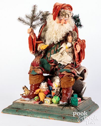 Appraisal: LARGE SEATED SANTALarge seated Santa comprised of painted composition heads