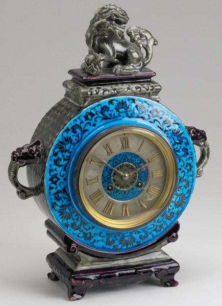 Appraisal: AESTHETIC MOVEMENT FRENCH CLOCK In art pottery case in the