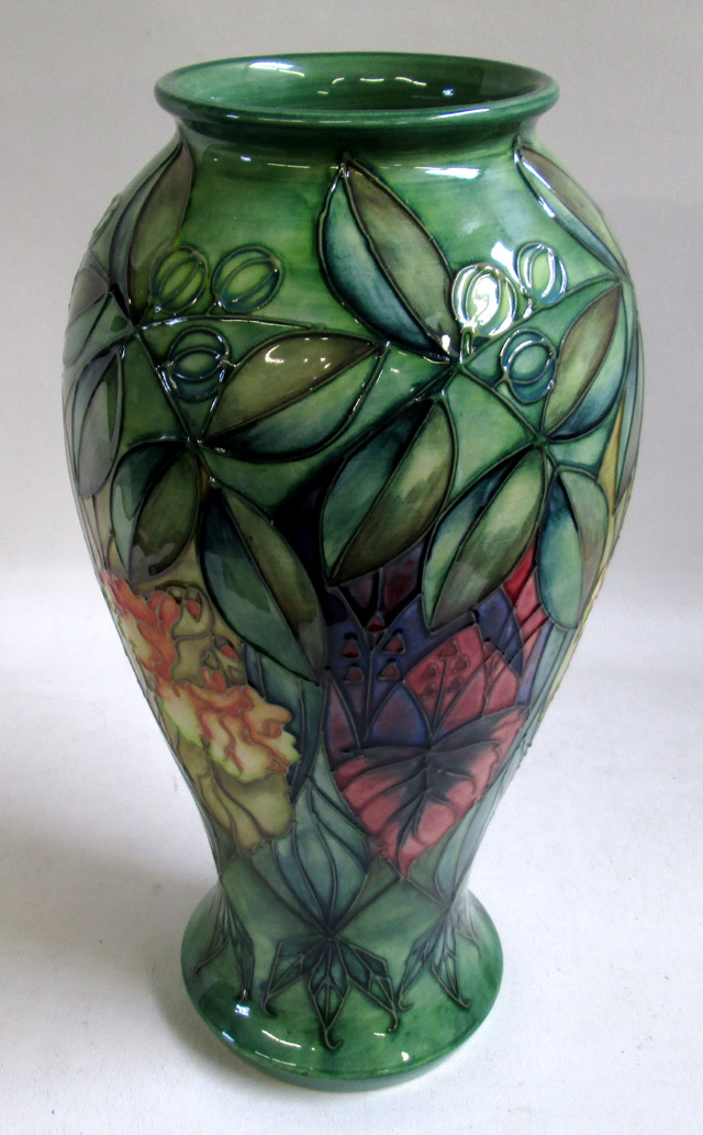 Appraisal: MOORCROFT POTTERY HIGH SHOULDER VASE in an orchid pattern on