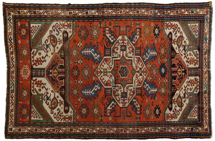 Appraisal: ANTIQUE RUSSIAN KRACHOPH KAZAK RUG Colorful rug has central geometric