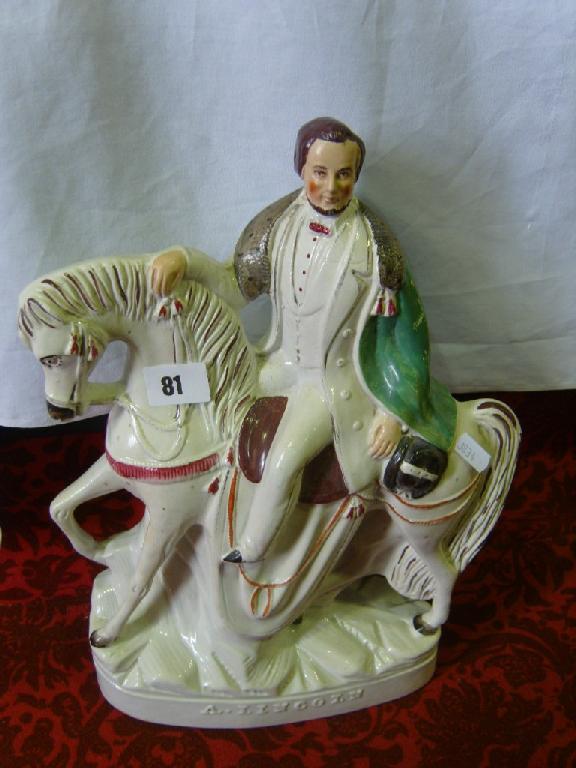 Appraisal: A th century Staffordshire equestrian figure of Abraham Lincoln with