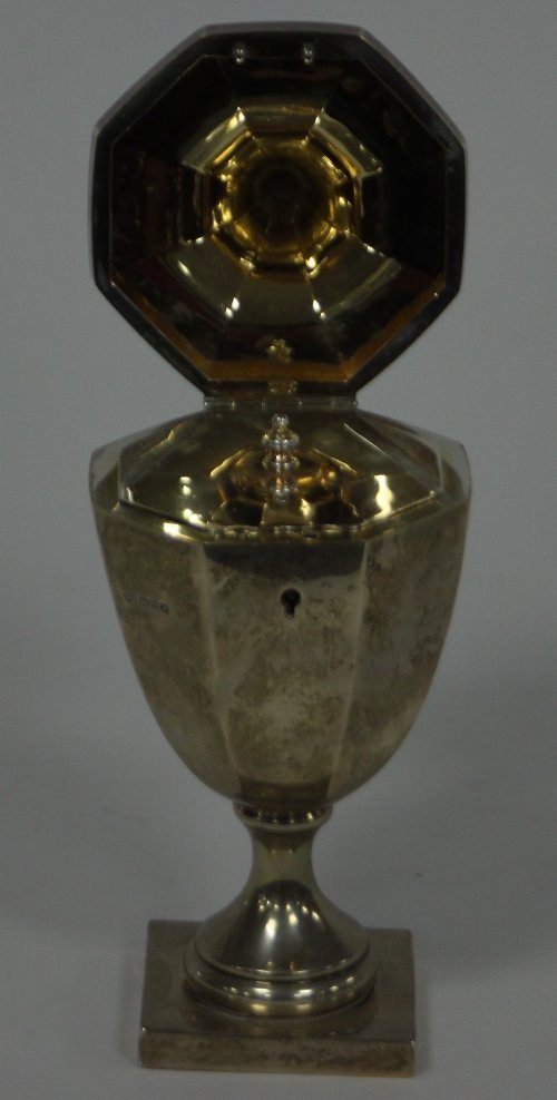 Appraisal: A silver tea caddy Chester of octagonal vase shape the