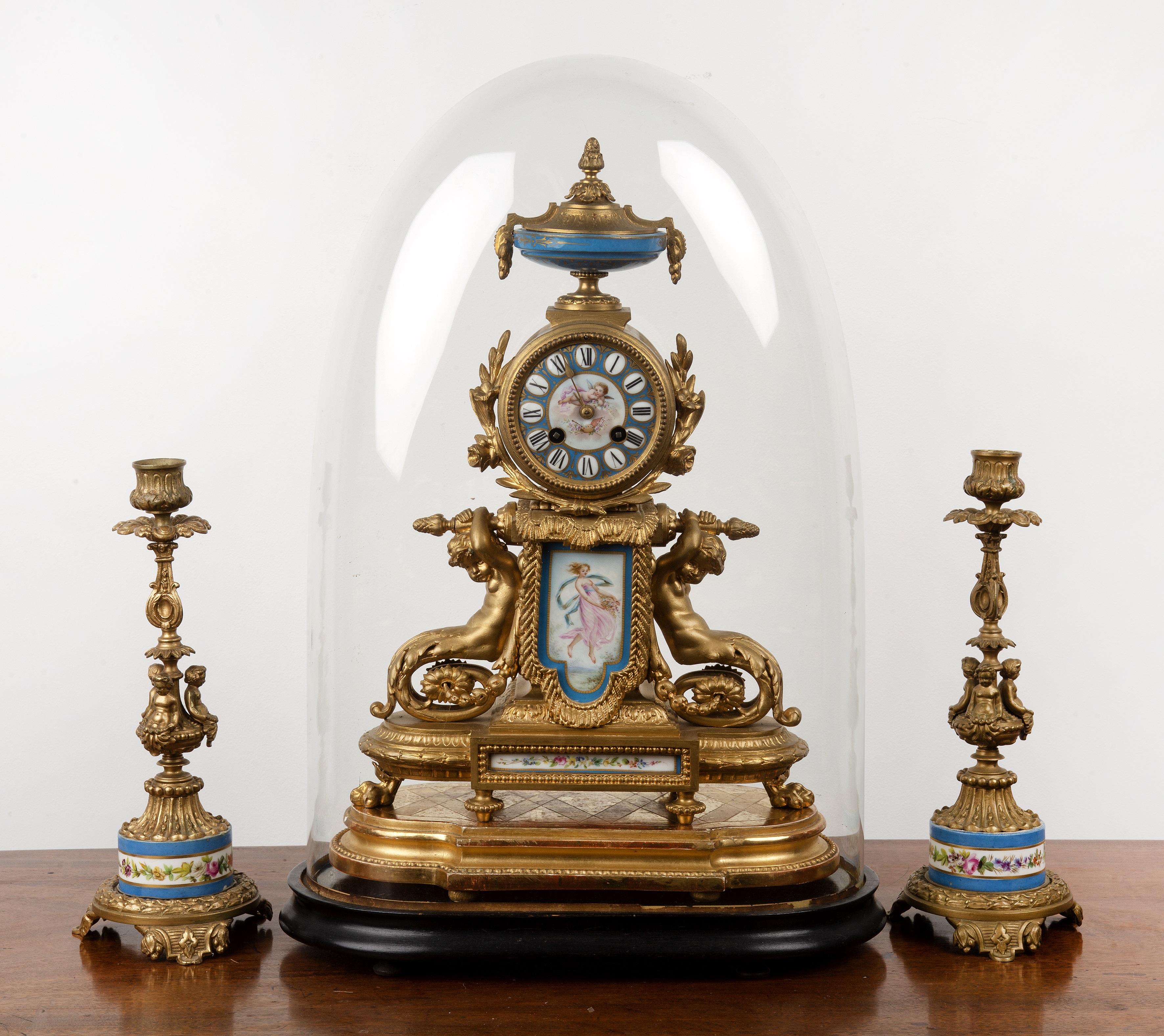 Appraisal: Phillipe H Mourey P H Mourey three piece clock garniture