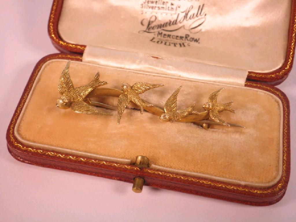 Appraisal: A Victorian bar brooch with four applied graduated swifts Chester