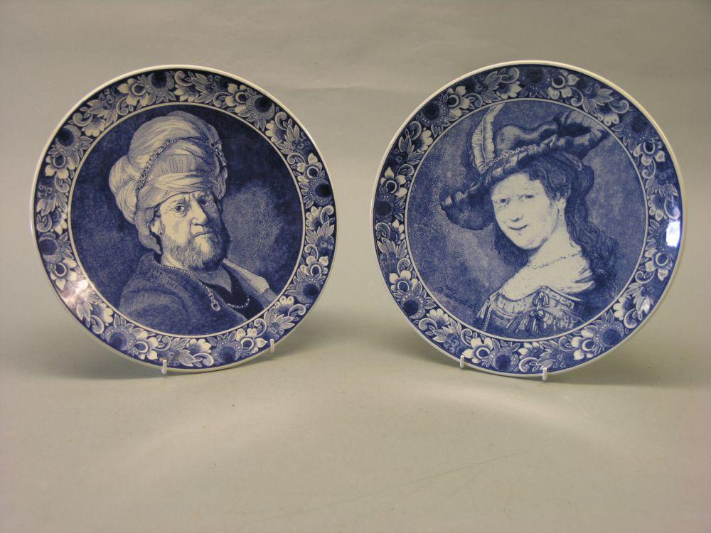 Appraisal: A pair of modern Delft wall plates each printed with