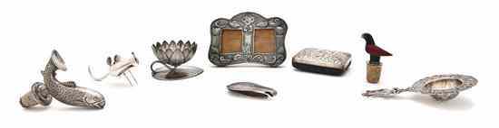 Appraisal: A Collection of Silver and Silvered Metal Articles comprising a