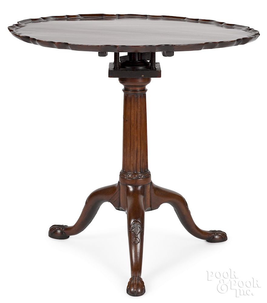 Appraisal: George III mahogany piecrust tea table Exclusive on Bidsquare George