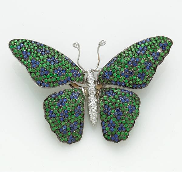 Appraisal: A tsavorite garnet sapphire and diamond butterfly brooch mounted in