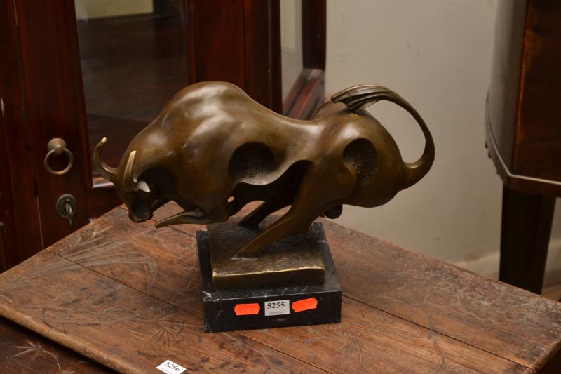 Appraisal: A BRONZE ABSTRACT BULL ON MARBLE BASE SIGNED MILO A