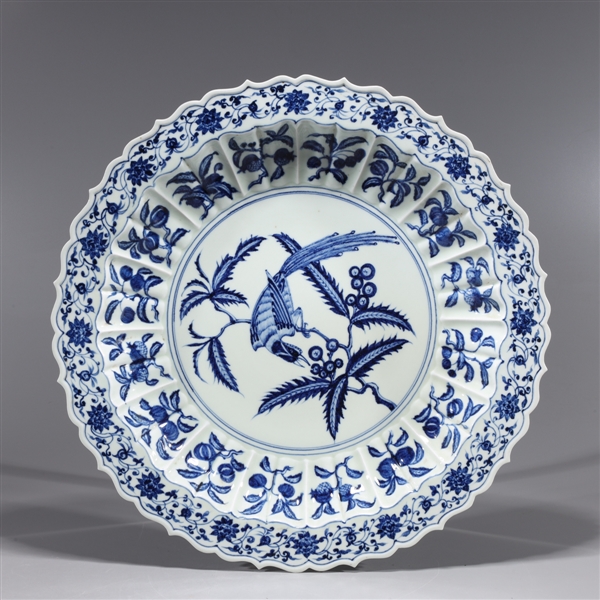 Appraisal: Large Chinese blue and white porcelain charger with bird and