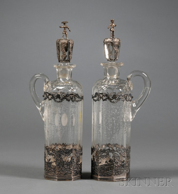 Appraisal: Pair of Dutch Silver Mounted Colorless Glass Cruets bearing export