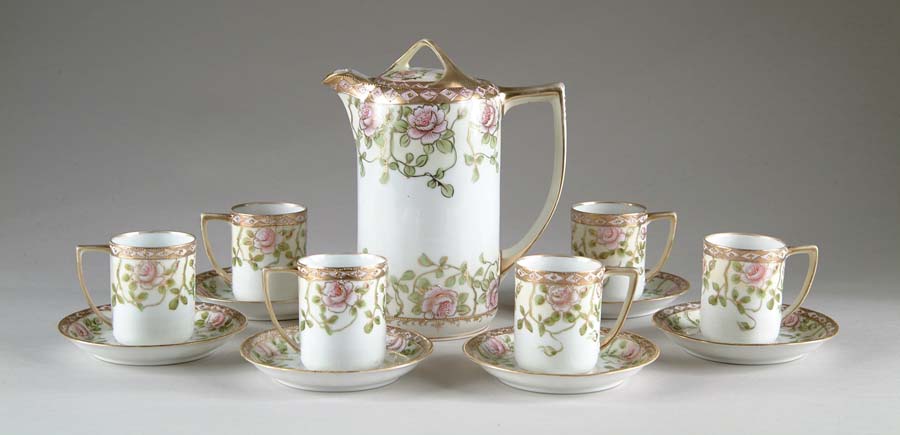 Appraisal: NIPPON CHOCOLATE POT SET Decoration of pink wild roses green