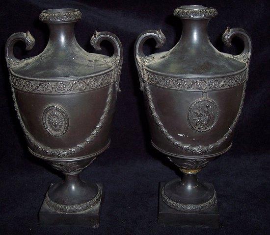 Appraisal: A pair of th Century black basalt urns by I