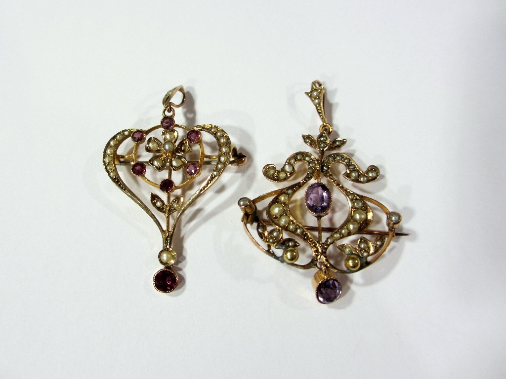 Appraisal: Two pretty Edwardian ct gold pendants of open scroll design