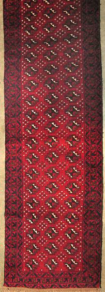 Appraisal: An Afghan runner size approximately ft in x ft in