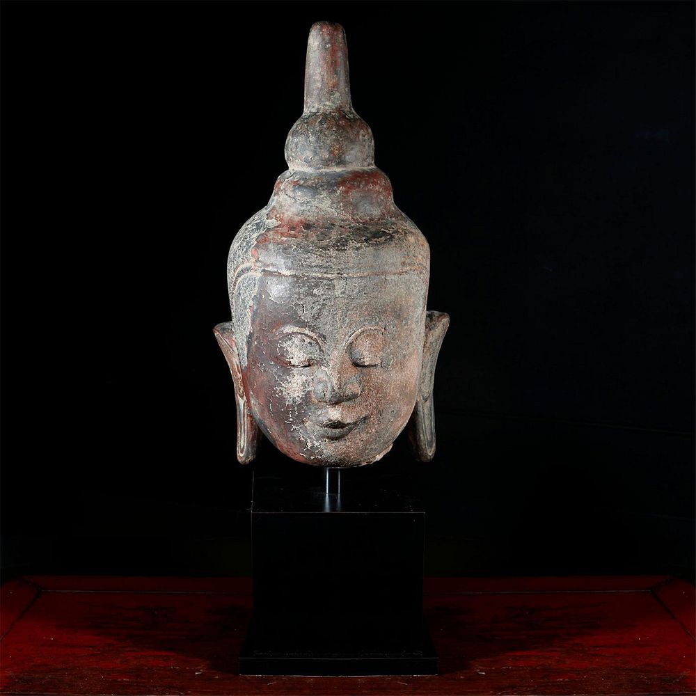 Appraisal: LARGE TH CENTURY THAI STONE HEAD OF BUDDHA WOODEN BASE