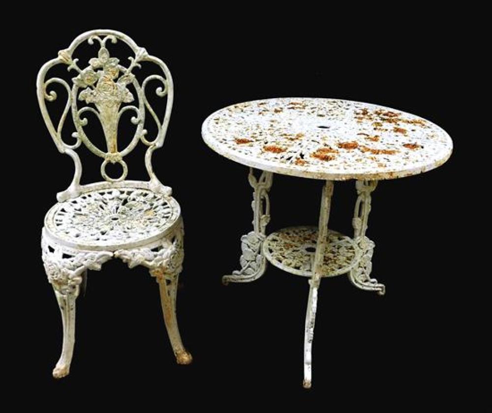 Appraisal: GARDEN Cast iron table and side chair with rose motif